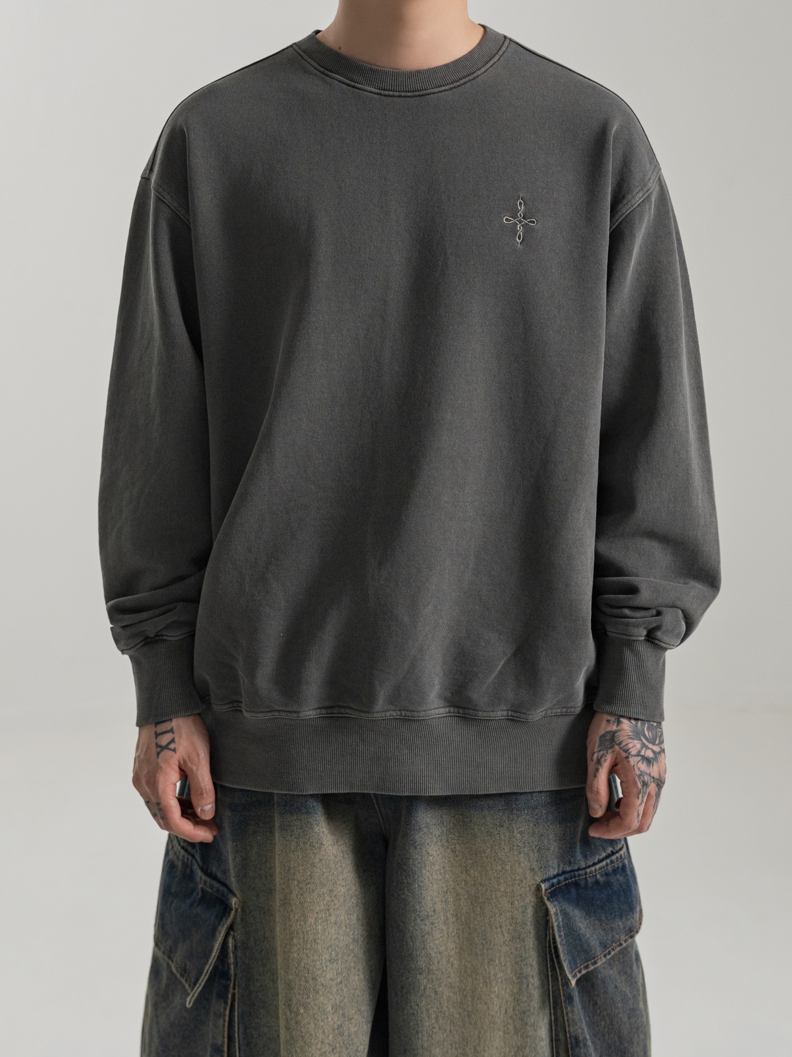PIGMENT FADE SWEATSHIRT in FADED GRAPHITE, studio photograph, worn by a male model in size L, upper-body view